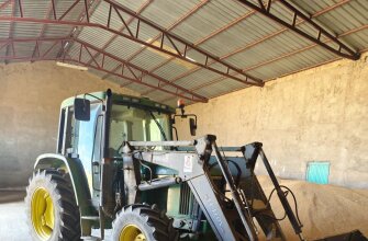 John Deere 6200 con Pala El León 385