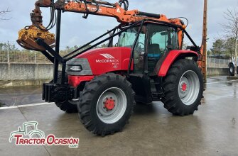 MCCORMICK MC120 CON GRUA Y REMOLQUE GUERRA